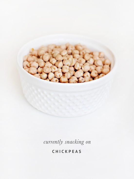 White bowl filled with chickpeas for healthy dog treat recipes.