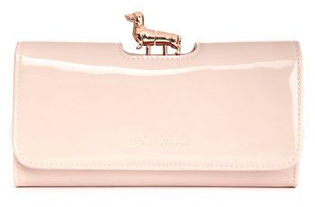 Ted Baker pale pink patent leather purse featuring a gold dachshund bobble clasp for stylish dog mums.
