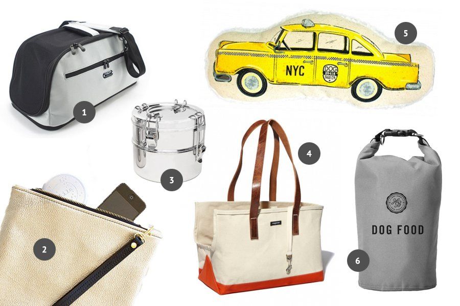 Trendy dog travel accessories including a canvas dog carrier tote bag, stainless steel bowls, and a taxi toy.
