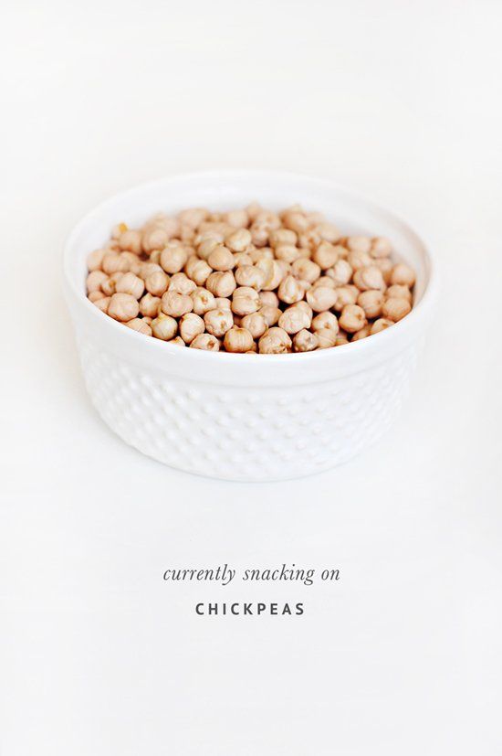 White bowl filled with chickpeas for healthy dog treat recipes.