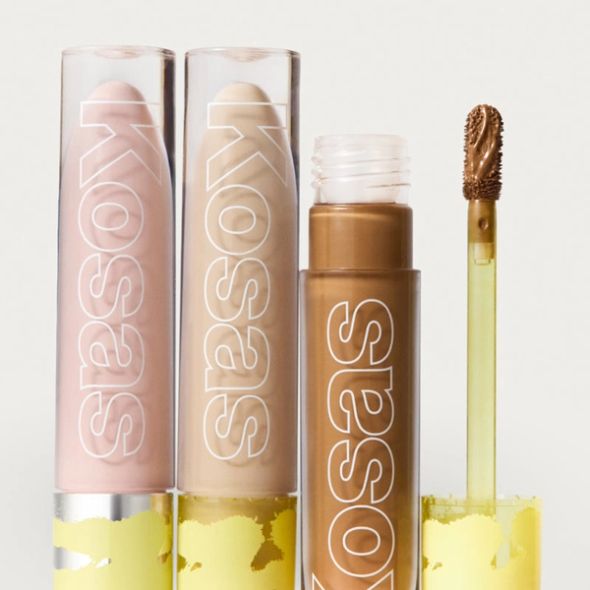 Three Kosas makeup tubes, including an open brown product with a doe-foot applicator.