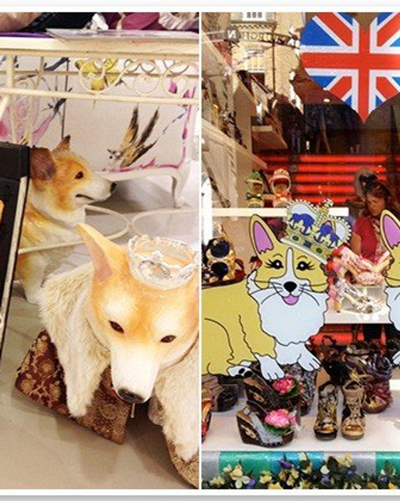 Corgi statues and cartoon illustrations wearing crowns in a Queen's Diamond Jubilee store display with a Union Jack.