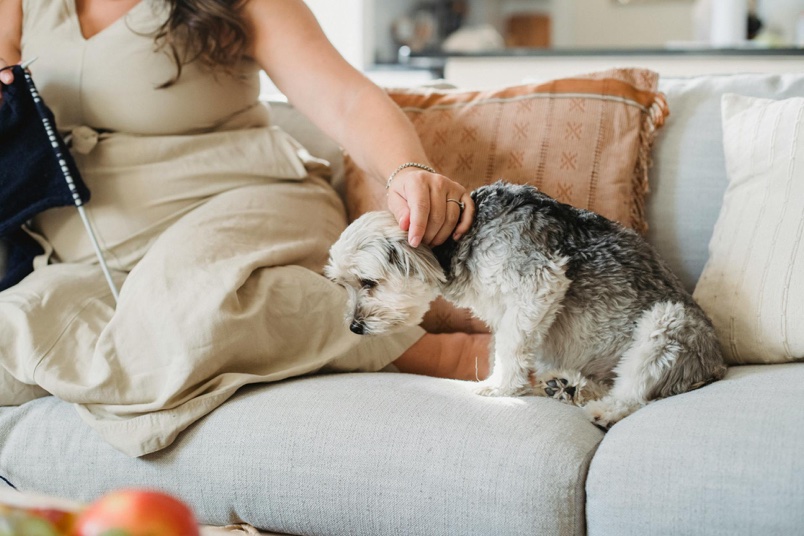 woman playing with her dog