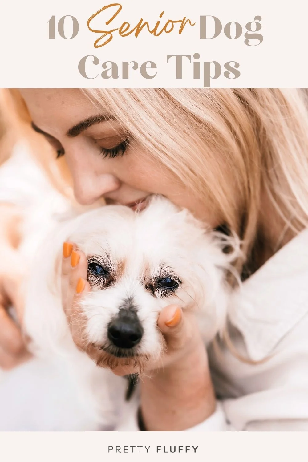 woman lovingly holding an old dog