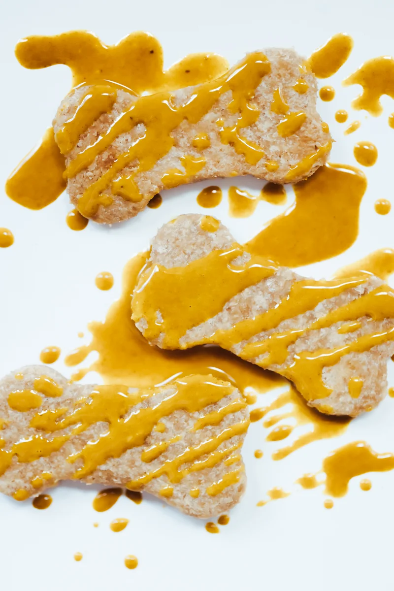 peanut butter cookies for dogs drizzled with turmeric icing